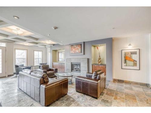 4504-5605 Henwood Street Sw, Calgary, AB - Indoor Photo Showing Living Room With Fireplace