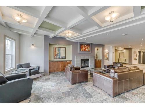 4504-5605 Henwood Street Sw, Calgary, AB - Indoor With Fireplace