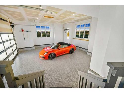 31 Windhorse Green, Rural Rocky View County, AB - Indoor Photo Showing Garage