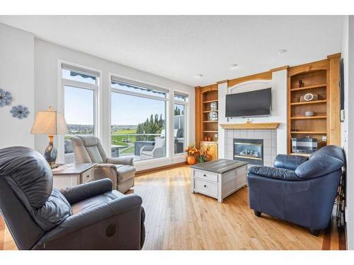 90 Panorama Hills View Nw, Calgary, AB - Indoor Photo Showing Living Room With Fireplace