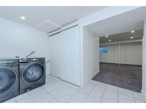 77-1155 Falconridgee Drive Ne, Calgary, AB - Indoor Photo Showing Laundry Room