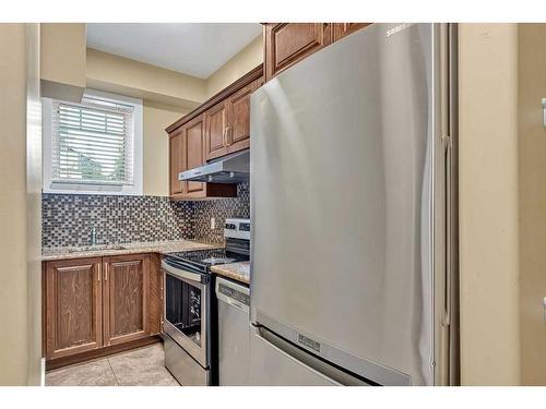 161 Stonemere Close, Chestermere, AB - Indoor Photo Showing Kitchen With Stainless Steel Kitchen