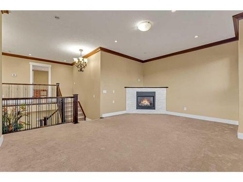 161 Stonemere Close, Chestermere, AB - Indoor With Fireplace