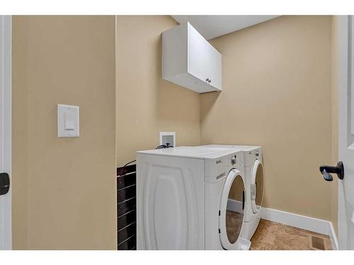 161 Stonemere Close, Chestermere, AB - Indoor Photo Showing Laundry Room