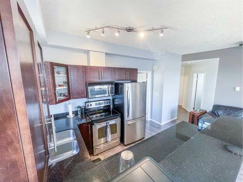 1001-1053 10 Street Sw, Calgary, AB - Indoor Photo Showing Kitchen With Stainless Steel Kitchen