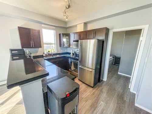 1001-1053 10 Street Sw, Calgary, AB - Indoor Photo Showing Kitchen With Stainless Steel Kitchen