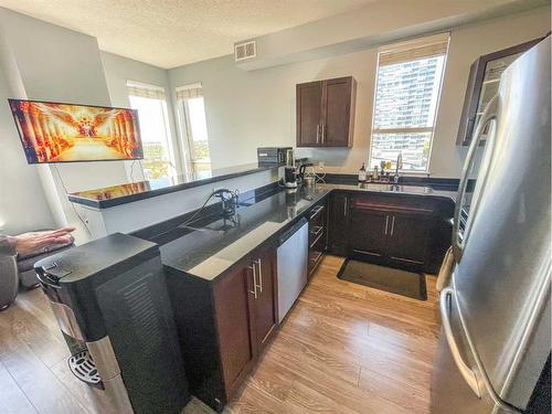 1001-1053 10 Street Sw, Calgary, AB - Indoor Photo Showing Kitchen With Double Sink