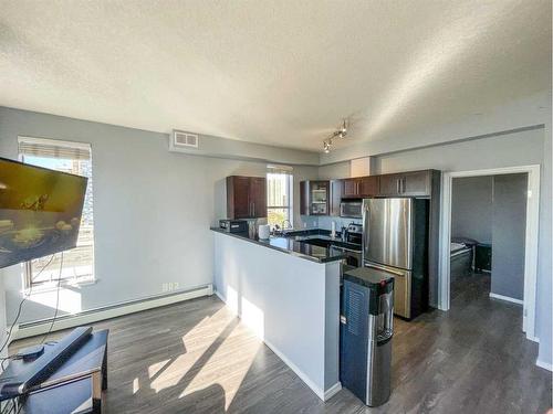 1001-1053 10 Street Sw, Calgary, AB - Indoor Photo Showing Kitchen With Stainless Steel Kitchen