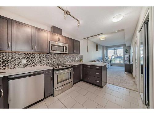 306-1320 1 Street Se, Calgary, AB - Indoor Photo Showing Kitchen With Upgraded Kitchen