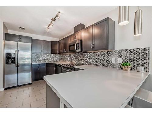 306-1320 1 Street Se, Calgary, AB - Indoor Photo Showing Kitchen With Upgraded Kitchen