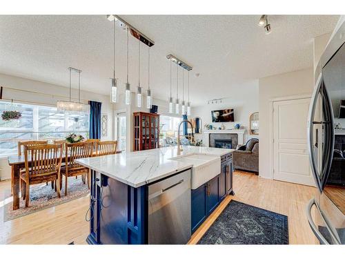 71 Copperfield Point Se, Calgary, AB - Indoor Photo Showing Kitchen With Double Sink With Upgraded Kitchen