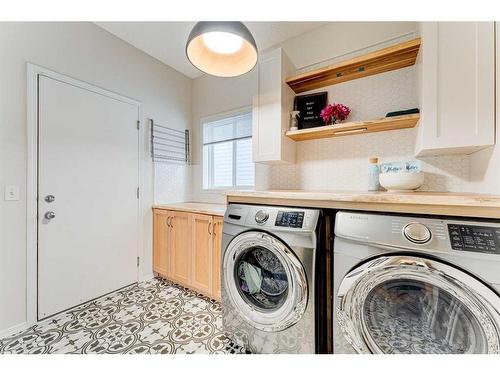 71 Copperfield Point Se, Calgary, AB - Indoor Photo Showing Laundry Room