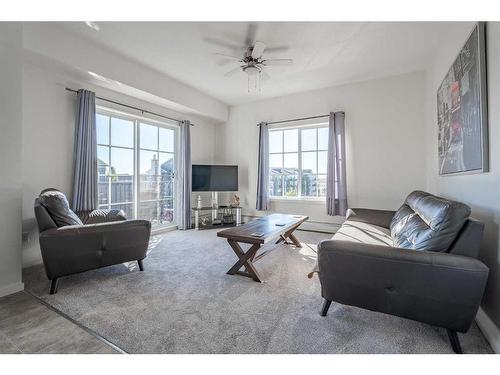 4418-99 Copperstone Park Se, Calgary, AB - Indoor Photo Showing Living Room