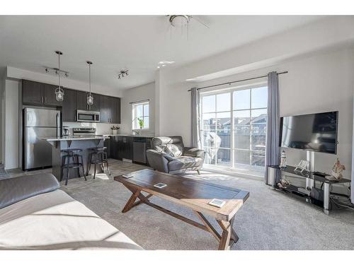 4418-99 Copperstone Park Se, Calgary, AB - Indoor Photo Showing Living Room