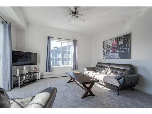 4418-99 Copperstone Park Se, Calgary, AB - Indoor Photo Showing Living Room