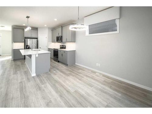 23 Wolf Hollow Way Se, Calgary, AB - Indoor Photo Showing Kitchen