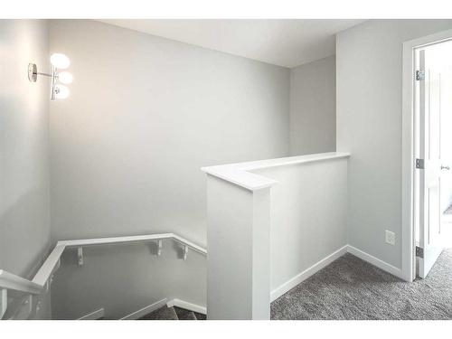 23 Wolf Hollow Way Se, Calgary, AB - Indoor Photo Showing Other Room