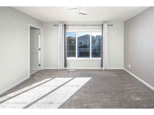 23 Wolf Hollow Way Se, Calgary, AB - Indoor Photo Showing Other Room