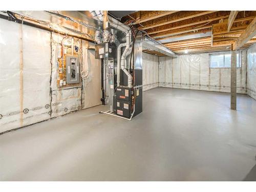 23 Wolf Hollow Way Se, Calgary, AB - Indoor Photo Showing Basement