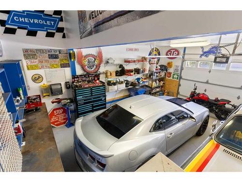 168 Sunset View, Cochrane, AB - Indoor Photo Showing Garage