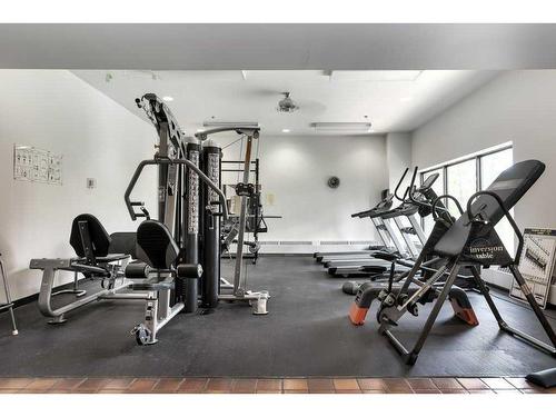 518-8604 48 Avenue Nw, Calgary, AB - Indoor Photo Showing Gym Room