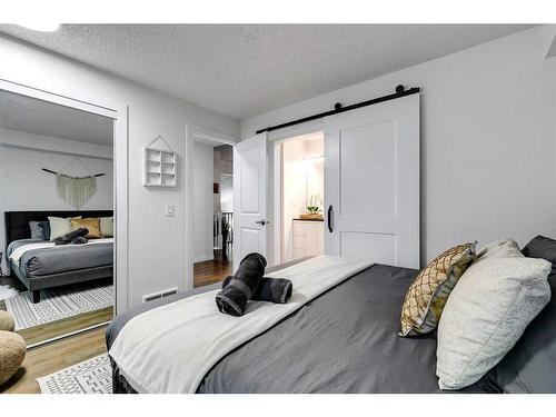 104 Mckerrell Crescent Se, Calgary, AB - Indoor Photo Showing Bedroom