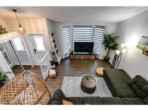 104 Mckerrell Crescent Se, Calgary, AB - Indoor Photo Showing Living Room