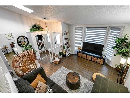 104 Mckerrell Crescent Se, Calgary, AB - Indoor Photo Showing Living Room