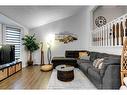 104 Mckerrell Crescent Se, Calgary, AB  - Indoor Photo Showing Living Room 