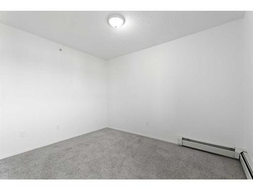 411`-1717 60 Street Se, Calgary, AB - Indoor Photo Showing Other Room