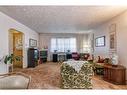 2451 23 Street Nw, Calgary, AB  - Indoor Photo Showing Living Room 