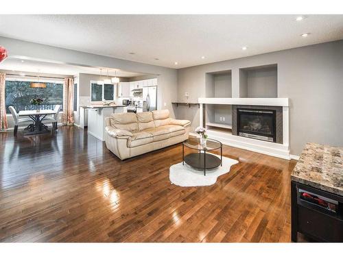 127 Covepark Place Ne, Calgary, AB - Indoor Photo Showing Living Room With Fireplace