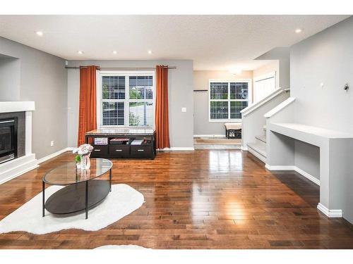 127 Covepark Place Ne, Calgary, AB - Indoor Photo Showing Living Room With Fireplace