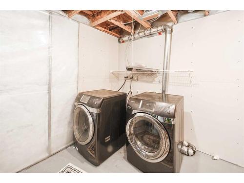 127 Covepark Place Ne, Calgary, AB - Indoor Photo Showing Laundry Room