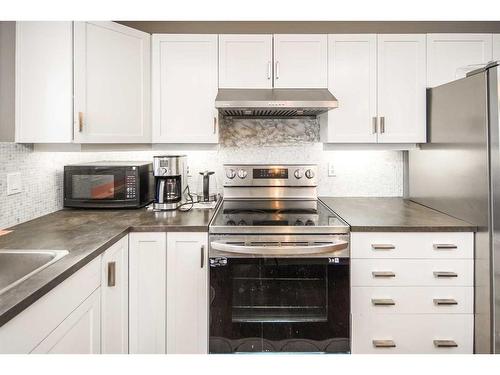 127 Covepark Place Ne, Calgary, AB - Indoor Photo Showing Kitchen