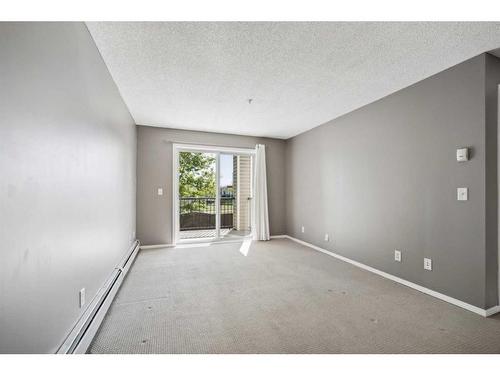 1228-2371 Eversyde Avenue Sw, Calgary, AB - Indoor Photo Showing Other Room