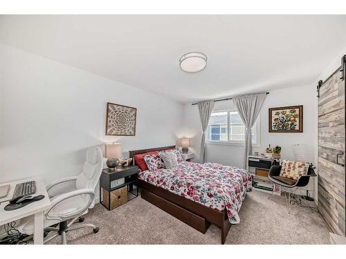 801-33 Merganser Drive West, Chestermere, AB - Indoor Photo Showing Bedroom