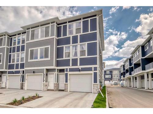 801-33 Merganser Drive West, Chestermere, AB - Outdoor With Facade