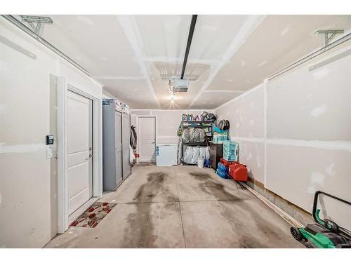 801-33 Merganser Drive West, Chestermere, AB - Indoor Photo Showing Garage