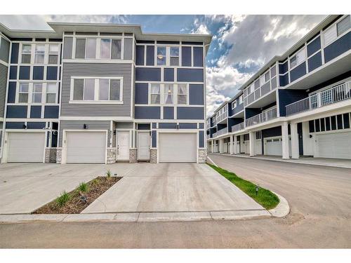 801-33 Merganser Drive West, Chestermere, AB - Outdoor With Facade