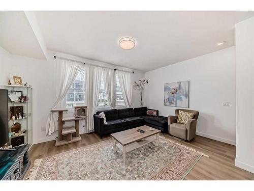 801-33 Merganser Drive West, Chestermere, AB - Indoor Photo Showing Living Room