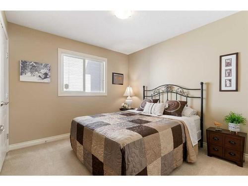 123 West Creek Meadow, Chestermere, AB - Indoor Photo Showing Bedroom