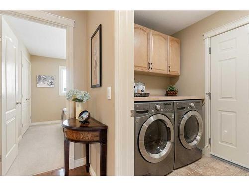 123 West Creek Meadow, Chestermere, AB - Indoor Photo Showing Laundry Room