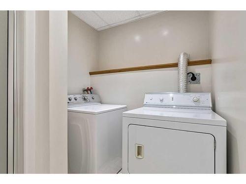 44 Sunhurst Place Se, Calgary, AB - Indoor Photo Showing Laundry Room