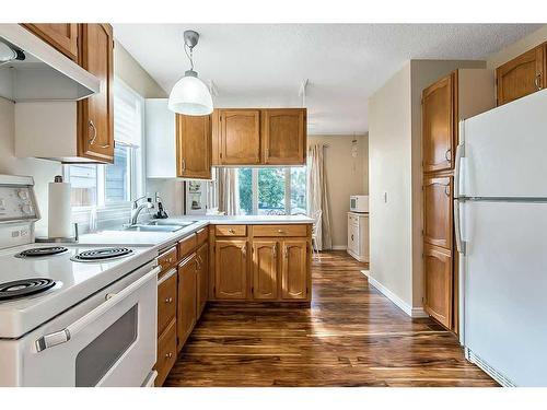 44 Sunhurst Place Se, Calgary, AB - Indoor Photo Showing Kitchen With Double Sink