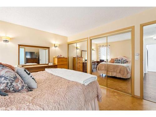 120 Tucker Road Se, Airdrie, AB - Indoor Photo Showing Bedroom