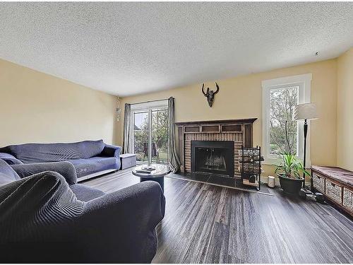 96 Beddington Circle Ne, Calgary, AB - Indoor Photo Showing Living Room With Fireplace