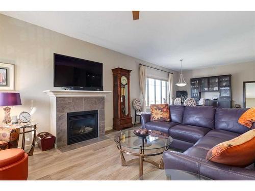 332-52 Cranfield Link Se, Calgary, AB - Indoor Photo Showing Living Room With Fireplace