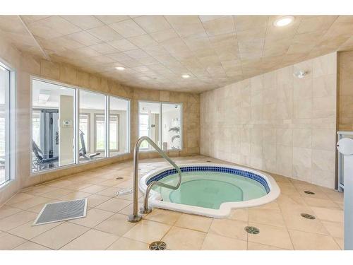 332-52 Cranfield Link Se, Calgary, AB - Indoor Photo Showing Other Room With In Ground Pool