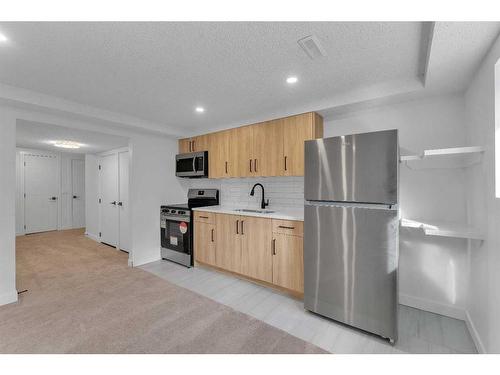 45 Templemont Drive Ne, Calgary, AB - Indoor Photo Showing Kitchen With Stainless Steel Kitchen